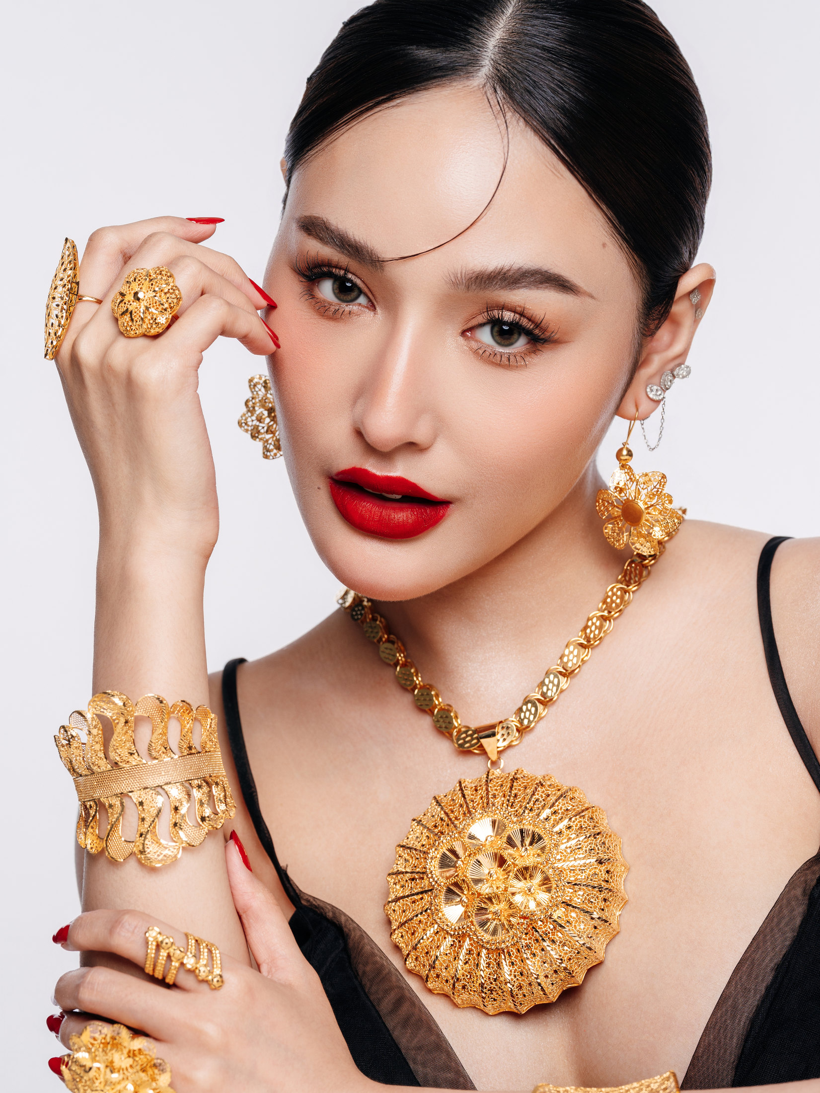 PNGB Precious Asher Jewellers about page featured gold jewelry portrait