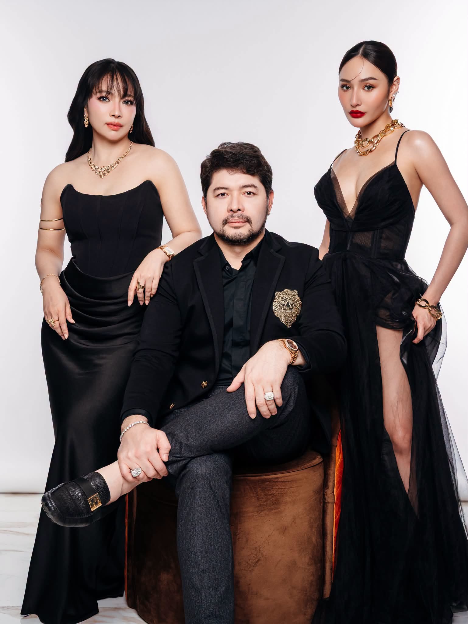 PNGB Precious Asher Jewellers featured personalities in formal black attire with gold jewelry