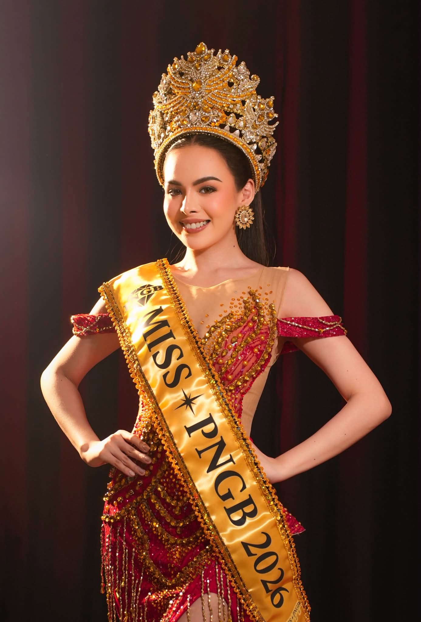 PNGB Precious Asher Jewellers contact page featured personality wearing elegant gold jewelry