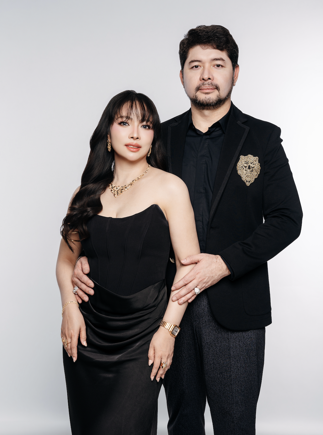 PNGB Precious Asher Jewellers featured personalities in formal black attire with gold jewelry